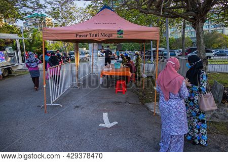 Putrajaya, Malaysia - October 09, 2020: Entry Control With Smartphone App And Temperature Measuremen