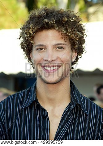 LOS ANGELES - AUG 02: Justin Guarini arrives for the Teen Choice Awards 2003 on August 02, 2003 in Los Angeles, CA