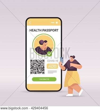 Woman Traveler Using Digital Immunity Passport With Qr Code On Smartphone Screen Risk Free Covid-19 