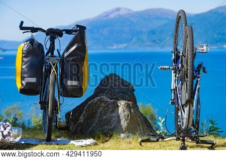 Bike Repair. Mountain Bicycle With Saddlebag Against Nature, Mountains Fjord Landscape In Norway