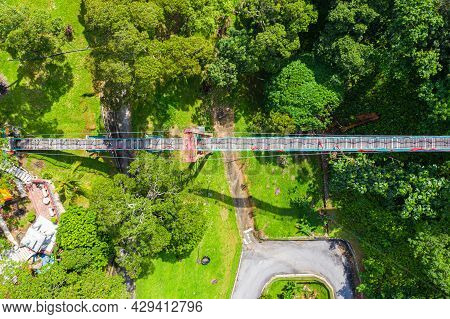 Suspension Bridge Over A Small Valley Near The Sak Dato Temple And Broga Hill. Tourist Attraction No