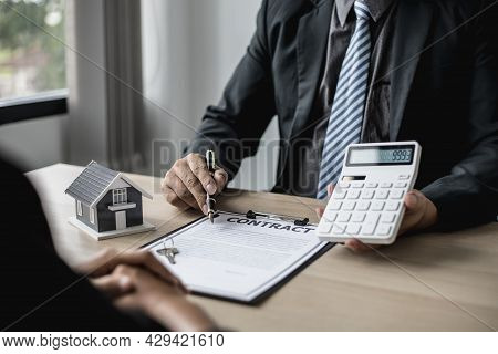 Employees Use The Calculator To Calculate Monthly Rent For Tenants And Explain Renting Details And C