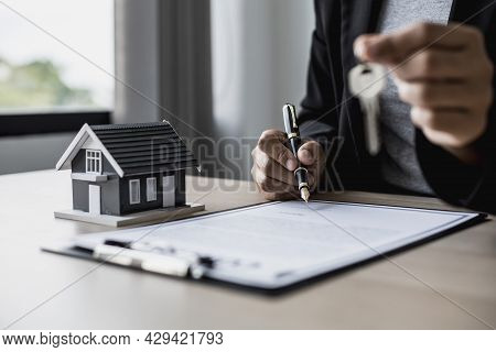 The Salesperson Is Checking The Contract Before Making An Appointment For The Customer To Join The C