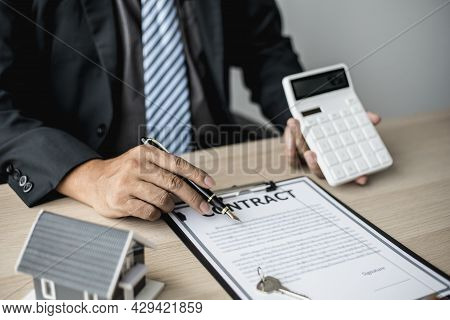 Employees Use The Calculator To Calculate Monthly Rent For Tenants And Explain Renting Details And C