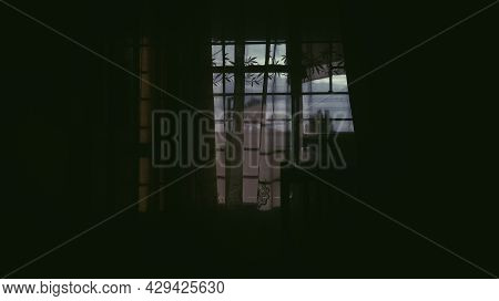 Silhouette Shot Of The Window At Day