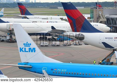 Amsterdam, Netherlands - July 11, 2017: Klm Airlines And Delta Air Lines At Schiphol Airport In Amst