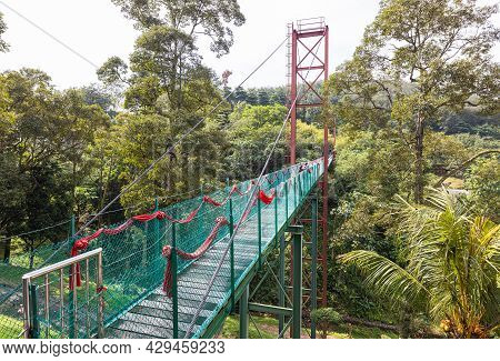 Suspension Bridge Over A Small Valley Near The Sak Dato Temple And Broga Hill. Tourist Attraction No