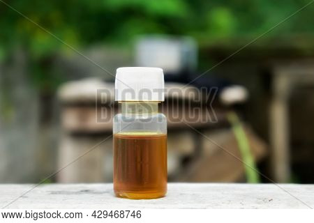 A Bottle Of Chemical Synthetic Garlic Oil Countryside Of India