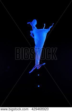 A Blue Splash On Black Background To Layer, Composite And Blend With Your Own Product Images To Add 
