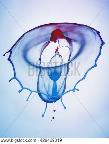 A Blue And Red Splash On A Blue Background To Layer, Composite And Blend With Your Own Product Image