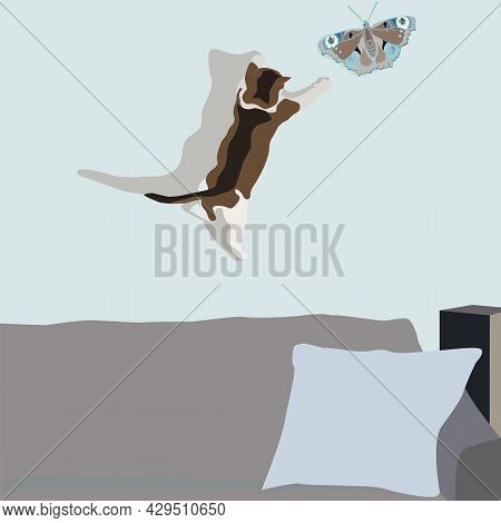 The Kitten Catches A Butterfly On The Wall