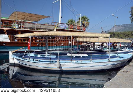 Boats and yachts at the in the marina of village  Akyaka - slow city in Turkey.August 1,2021. Mugla,Turkey