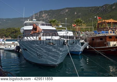 Boats and yachts at the in the marina of village  Akyaka - slow city in Turkey.August 1,2021. Mugla,Turkey