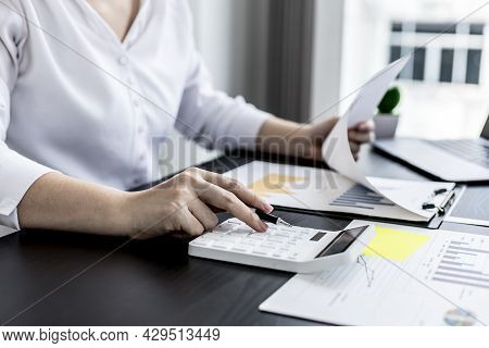 Financial Accountants Are Checking Documents From The Finance Department, Verifying Company Financia