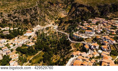 A Road Go Down Between The Albanian Mountains