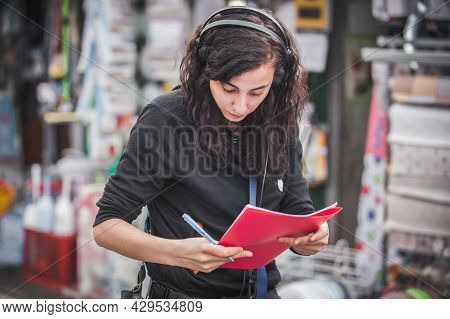 Sound Director Technician With Headset Writing Sound Recorder Audio Script