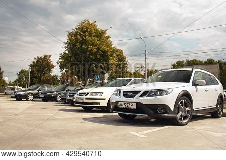 Chernihiv, Ukraine - July 24, 2021: Saab Cars Stand In A Row In A Parking Lot. Different Models Of T