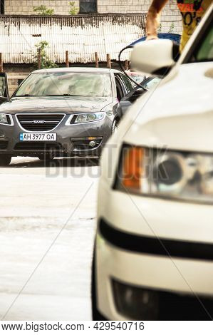 Chernigov, Ukraine - July 24, 2021: Saab Car At A Car Wash In Front Of Another Saab Car. White Saab 