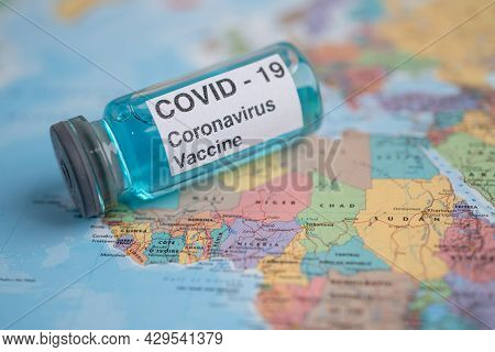Bangkok, Thailand - July 1, 2021, Coronavirus Covid-19 Vaccine On Africa Map, Development Medical Fo