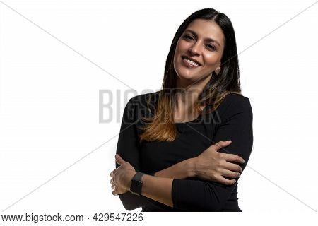 Positive Relaxed Young Businesswoman Smiling, Hugging Herself.