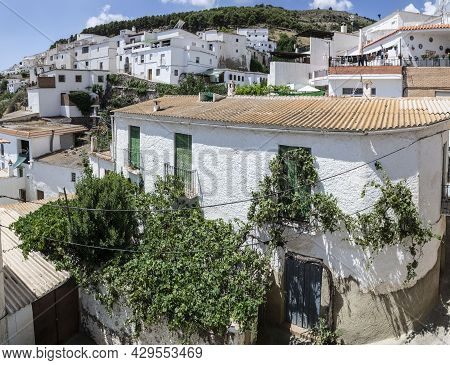White Houses Perched On The Mountain With Chimneys Of The Alpujarra