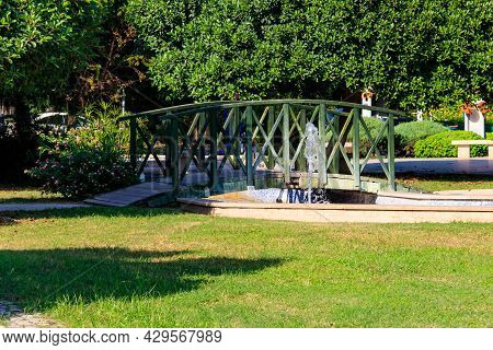 Arched Wooden Footbridge In Kugulu Park In Kemer Town, Turkey