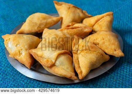 Homemade Samosa, Samsa Or Smosa. A Vegetarian Spicy Indian Special Traditional Street Food. Iftaari 
