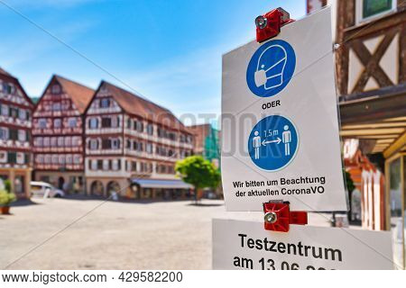 Mosbach, Germany - June 2021: Signs For Face Mask And Distance Requirement In German City With Text 