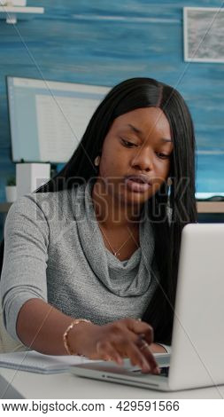 African American Student Working Remote From Home At Marketing Strategy Writing Financial Graphs On 