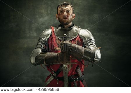 Portrait Of One Brutal Bearded Man, Medeival Warrior Or Knight With Dirty Wounded Face