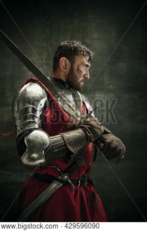 Side View. Portrait Of One Brutal Bearded Man, Medeival Warrior Or Knight With Dirty Wounded Face Ho