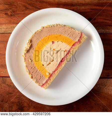 Colorful Cassata Ice Cream Is Served In A White Plate Over A Rustic Wooden Table, Thumbnail Picture