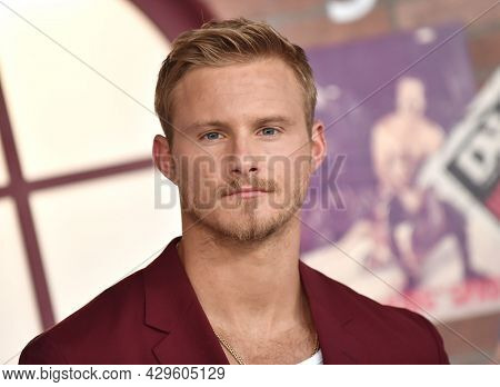 LOS ANGELES - AUG 08: Alexander Ludwig arrives for the STARZ 'Heels' Los Angeles Premiere on August 08, 2021 in Los Angeles, CA