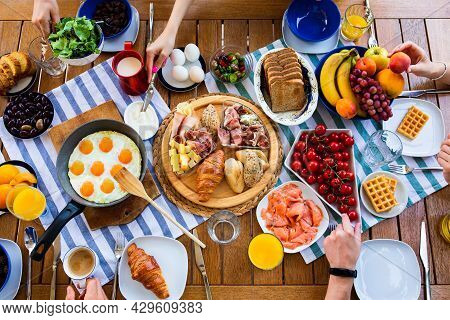 Laid Table With Food.breakfasts On The Table Top View.large Table With Food Top View. Food And Peopl