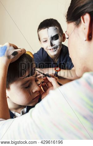 Little Cute Child Making Facepaint On Birthday Party, Zombie Apocalypse Facepainting, Halloween Prep