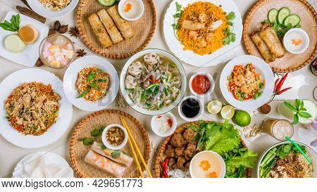 Assorted Asian Dinner, Vietnamese Food. Pho Ga, Pho Bo, Noodles, Spring Rolls Top View
