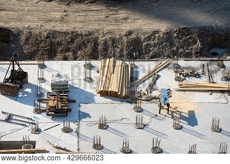 Closeup Of House Foundation Made From Concrete Shuttering Blocks Filled With Mortar And Reinforcemen
