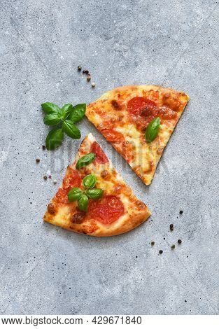 Slice Pizza With Sauce, Cheese And Basil. Cassic Pizza Margarita.