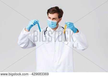 Hospital, Healthcare Workers, Covid-19 Treatment Concept. Serious Doctor, Professiona Lab Tech In Ho