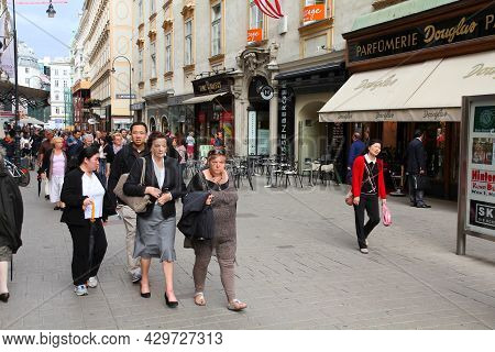 Vienna, Austria - September 9, 2011: People Visit Kohlmarkt Street In Old Town Of Vienna, Austria. H