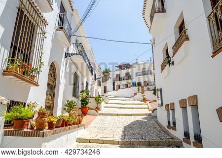 Picturesque Town Of Frigiliana Located In Mountainous Region Of Malaga, Andalusia, Spain