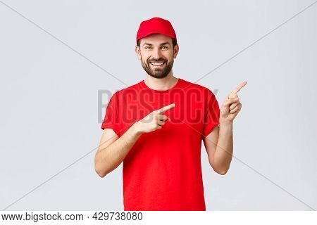 Online Shopping, Delivery During Quarantine And Takeaway Concept. Smiling Cheerful Courier Inform Cl