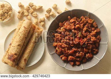 Dry Roasted Soya Chunks With Onions Tomatoes And Spices. Prepared With Kerala Style Meat Masala In C