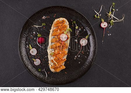 Roasted Red Pepper Spread - Muhammara On Baguette With Radish And Microherbs.