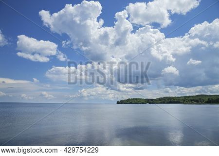 Mille Lacs Lake Southwest Side Below Dramatic Clouds In North Central Minnesota On A Sunny Summer Af