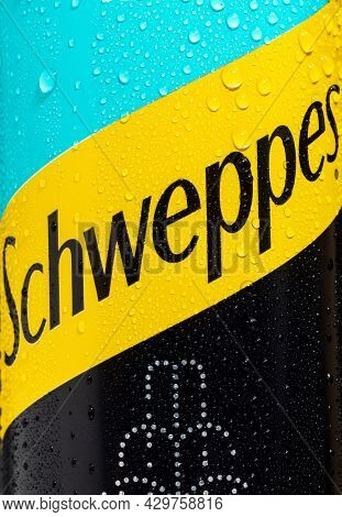Tyumen, Russia-may 25, 2021: Can Of The Schweppes Logo Close Up. Water Drops.