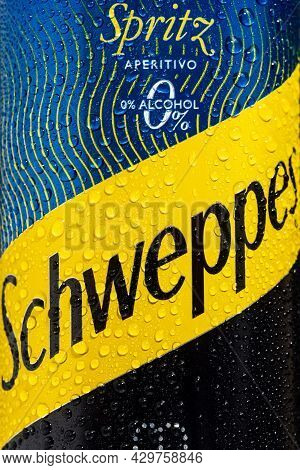 Tyumen, Russia-may 25, 2021: Can Of The Schweppes Logo Close Up. Water Drops. Vertical Photo
