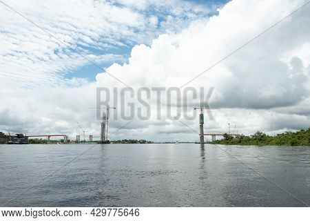 Peru, Amazon, Iquitos. The Nanay Bridge Is A Bridge Under Construction, Located In The Center Of The