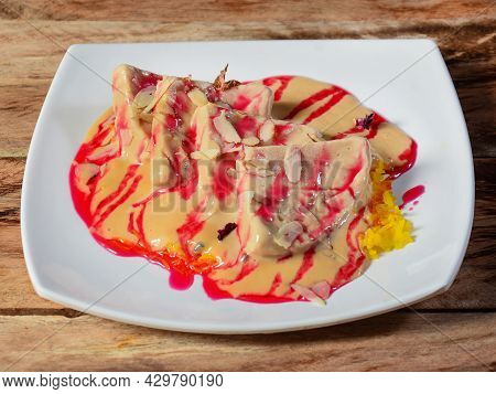 Kulfi Falooda, Rich Creamy Kulfi Topped With Falooda And Rose Syrup Is A Desert. Kulfi Is Our Very O