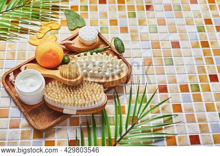 Jars Of Cream For Face And Body Care, Gold Eye Patches And Serum With Gold, Jade Roller Massager Gau